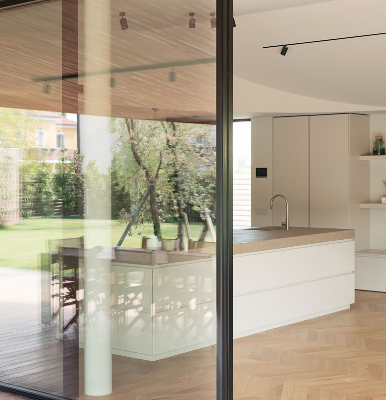 Vista della cucina open space della villa in campagna progettata da MIDE architetti.
