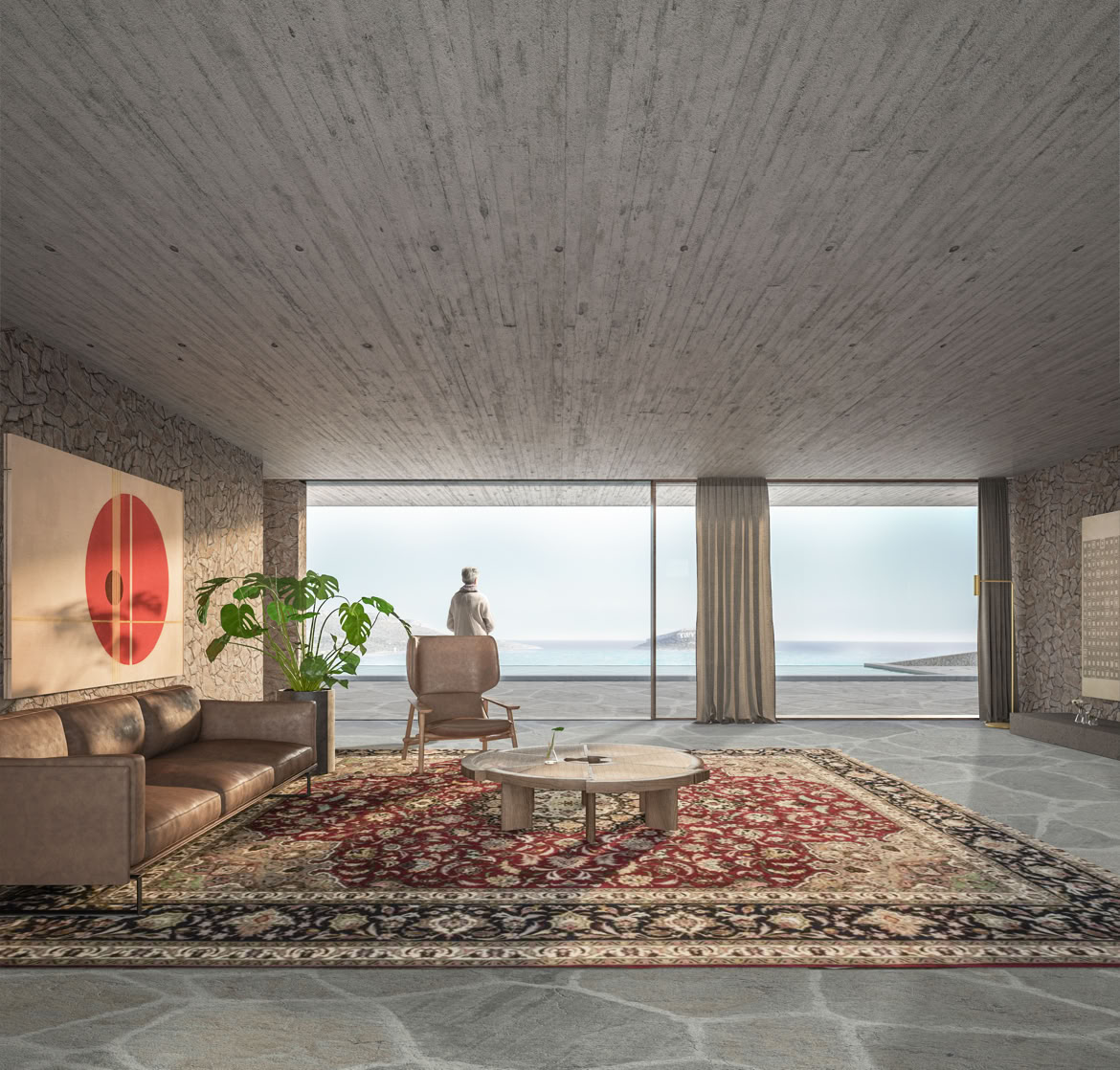 Open-plan living area with integrated kitchen and dining, designed to maximize natural light and connection with the garden and sea.