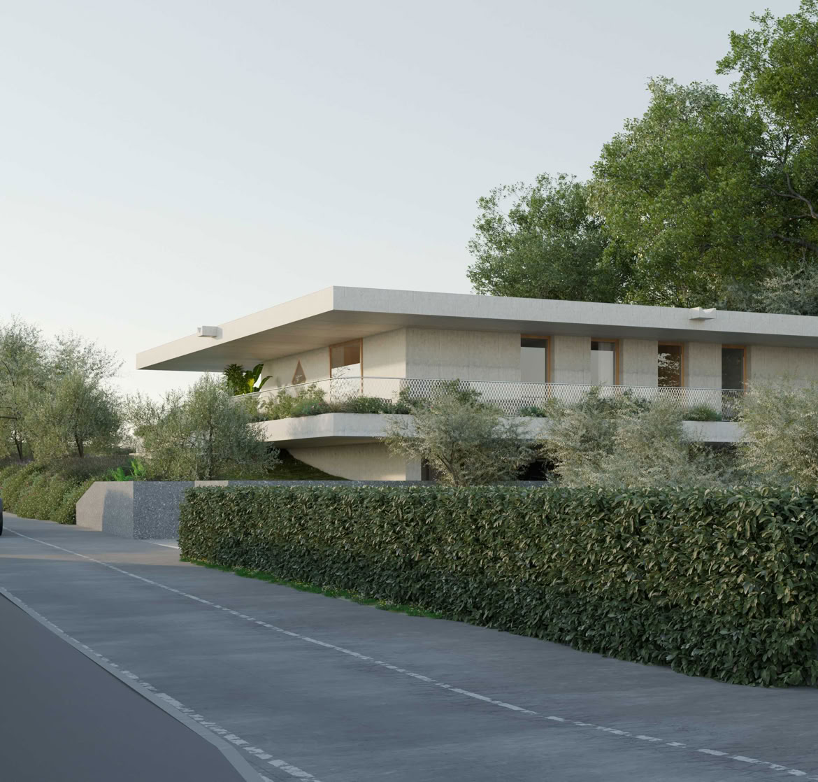 Villa sulla Soglia a Soiano del Lago vista dalla strada: villa contemporanea in calcestruzzo immersa nel verde della Valtenesi.