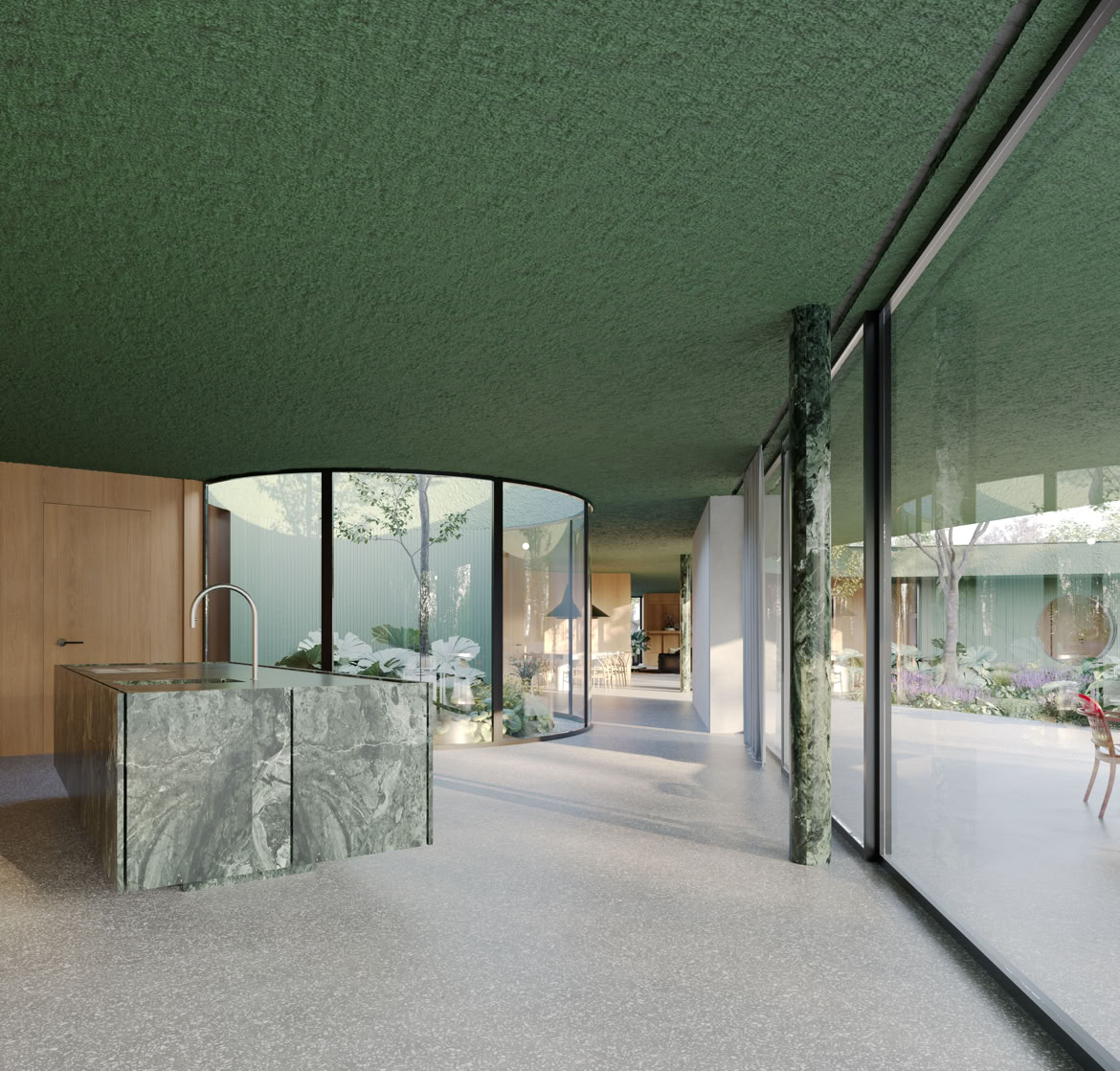Zona living con cucina della villa a Selvazzano progettata da MIDE architetti immersa nel verde e disegnata con geometrie pulite che regalano la privacy all'abitazione.