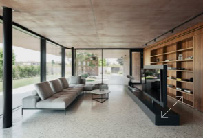 Un ampio salone con vetrate e materiali di pregio esprime la volontà architettonica dell'edificio progettatto da MIDE architetti.