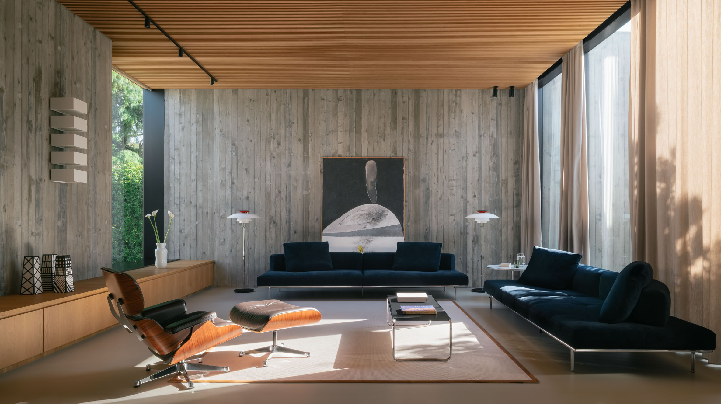 View from the living area onto the inner courtyard, where greenery becomes an integral part of the architectural design.